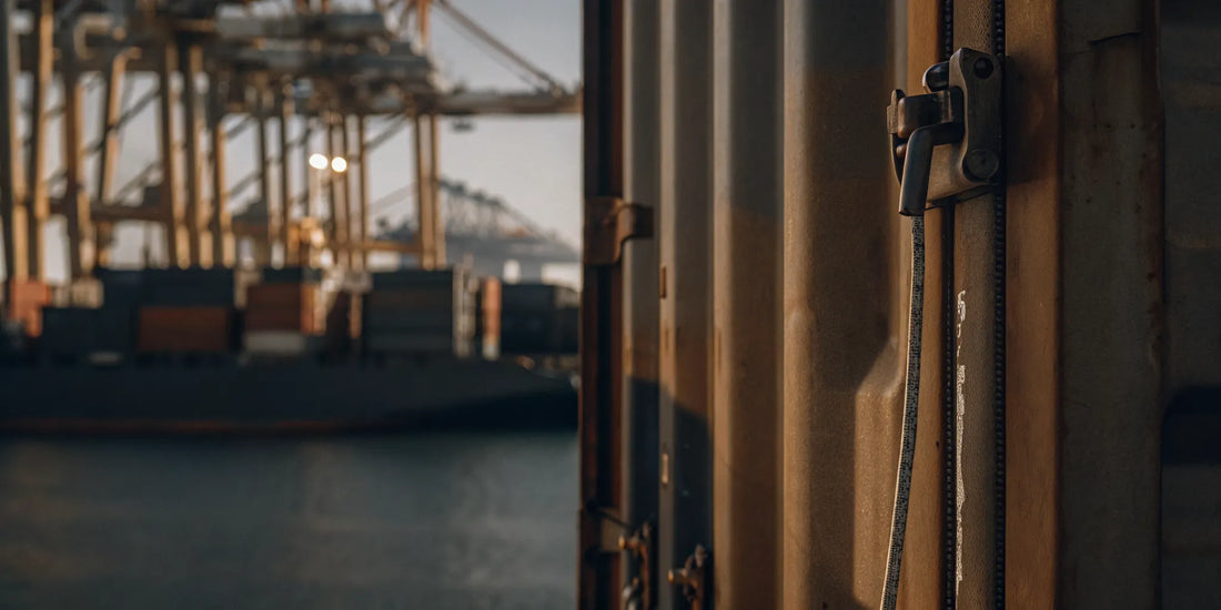 High-security bolt seal on a container at a tropical port