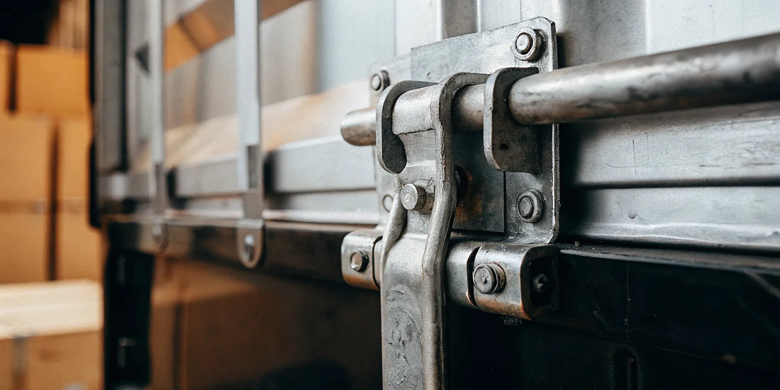A serialized high-security bolt seal locking a shipping container