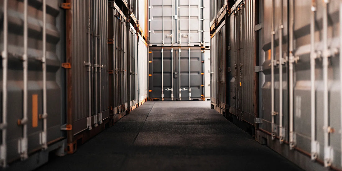 Shipping containers at a port with security seals on doors